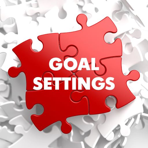 Goal Settings on Red Puzzle on White Background.
